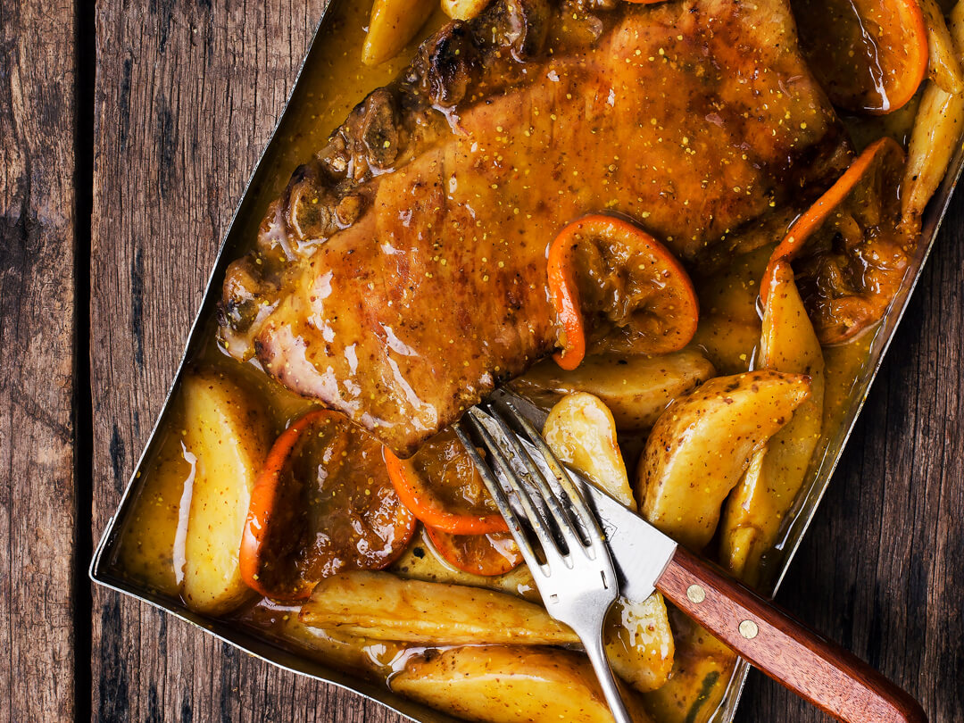 Cerdo al horno con miel y mostaza